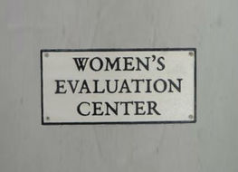 Women&#039;s evaluation centre sign